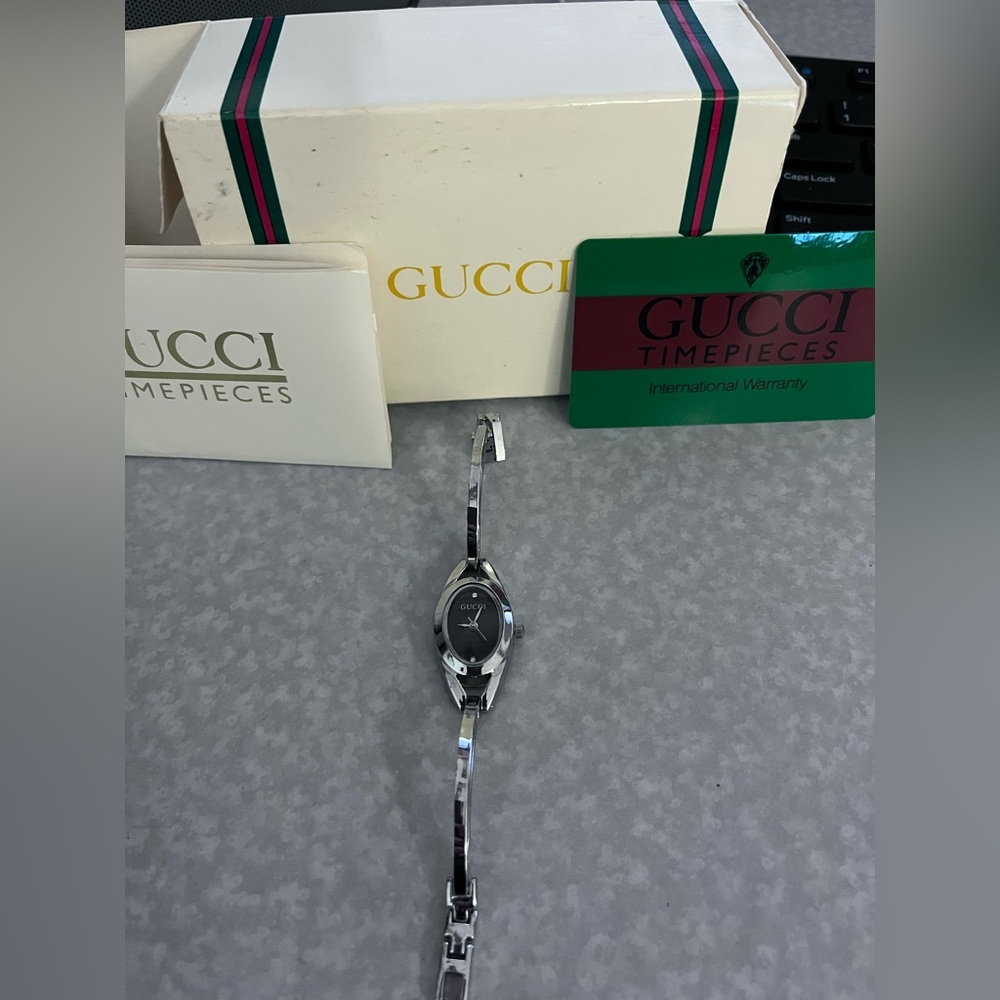 Authentic Gucci watch in EUC with 2 diamond markers❤️❤️